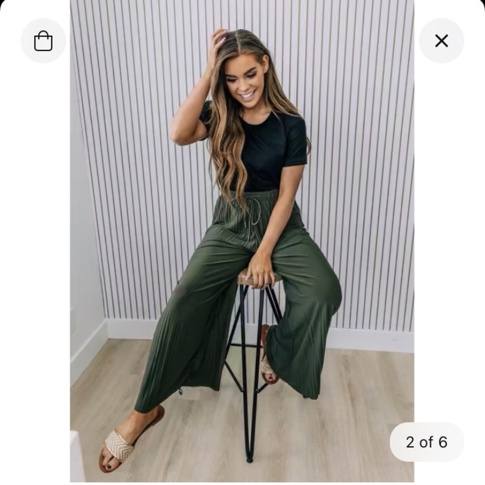 Olive green pleated flare pants